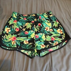 Fun tropical print workout or casual wear shorts. Has built-in undies. Size XL